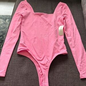 Francesca's Collections Pink Long Sleeve Bodysuit